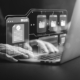 Person using a laptop with a digital access interface, representing security access control, user code management and access permissions.