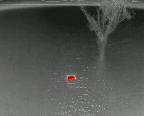 Thermal drone image from PGC Aerial Gallery detecting a submerged vehicle in floodwater.
