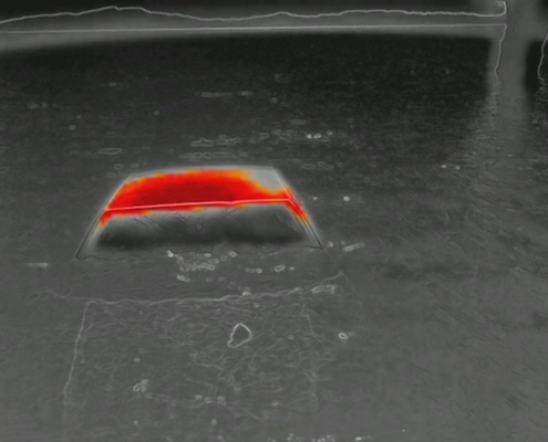 Thermal imaging from PGC Aerial Gallery showing heat detection of a submerged car in floodwater.
