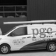 Three PGC Security vehicles parked outside a commercial building, representing mobile patrol and business security services.